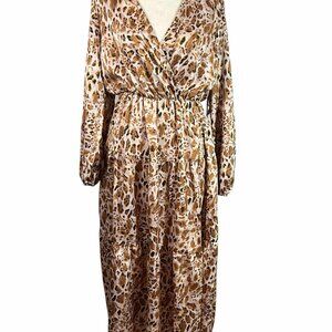 This Women's Dress in size Small features a stylish leopard print pattern, a tre